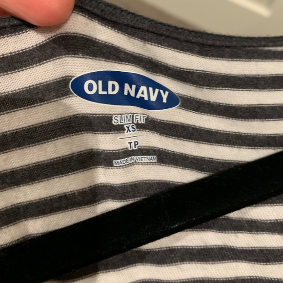 This is a extra small black and white striped t-shirt - Picture 3 of 3